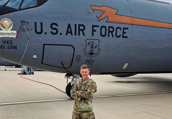 Air Force ROTC Cadet Cameron Todhunter has been selected to train and study at the U.S. Air Force Academy. Here, he stands in front of a KC-135 aircraft at Goldwater U.S. Air National Guard base.