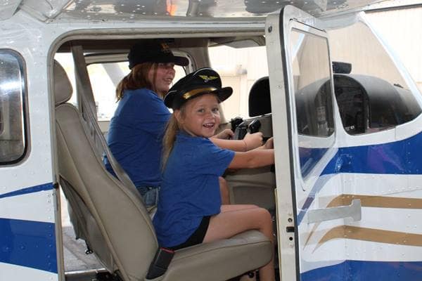 A participant in Girls in Aviation Day at Embry-Riddle’s Prescott Campus sits behind the controls of a Cessna 172. The annual event gives K–12 students a hands-on look at aviation.