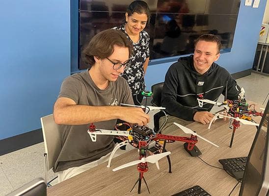 Embry-Riddle students Nicolas Machado and Kyrylo Holovenko work with Dr. Laxima Niure Kandel, who led this summer’s National Science Foundation Research Experience for Undergraduates (REU) at the Daytona Beach Campus.
