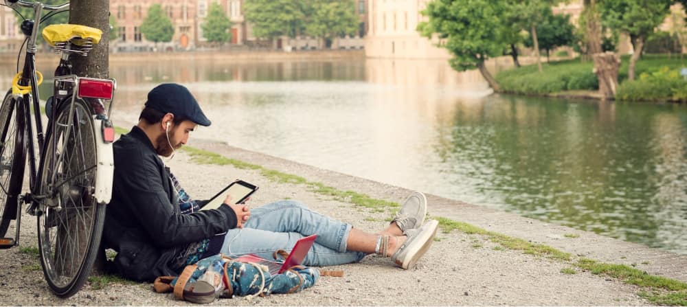 a student on a riverbed