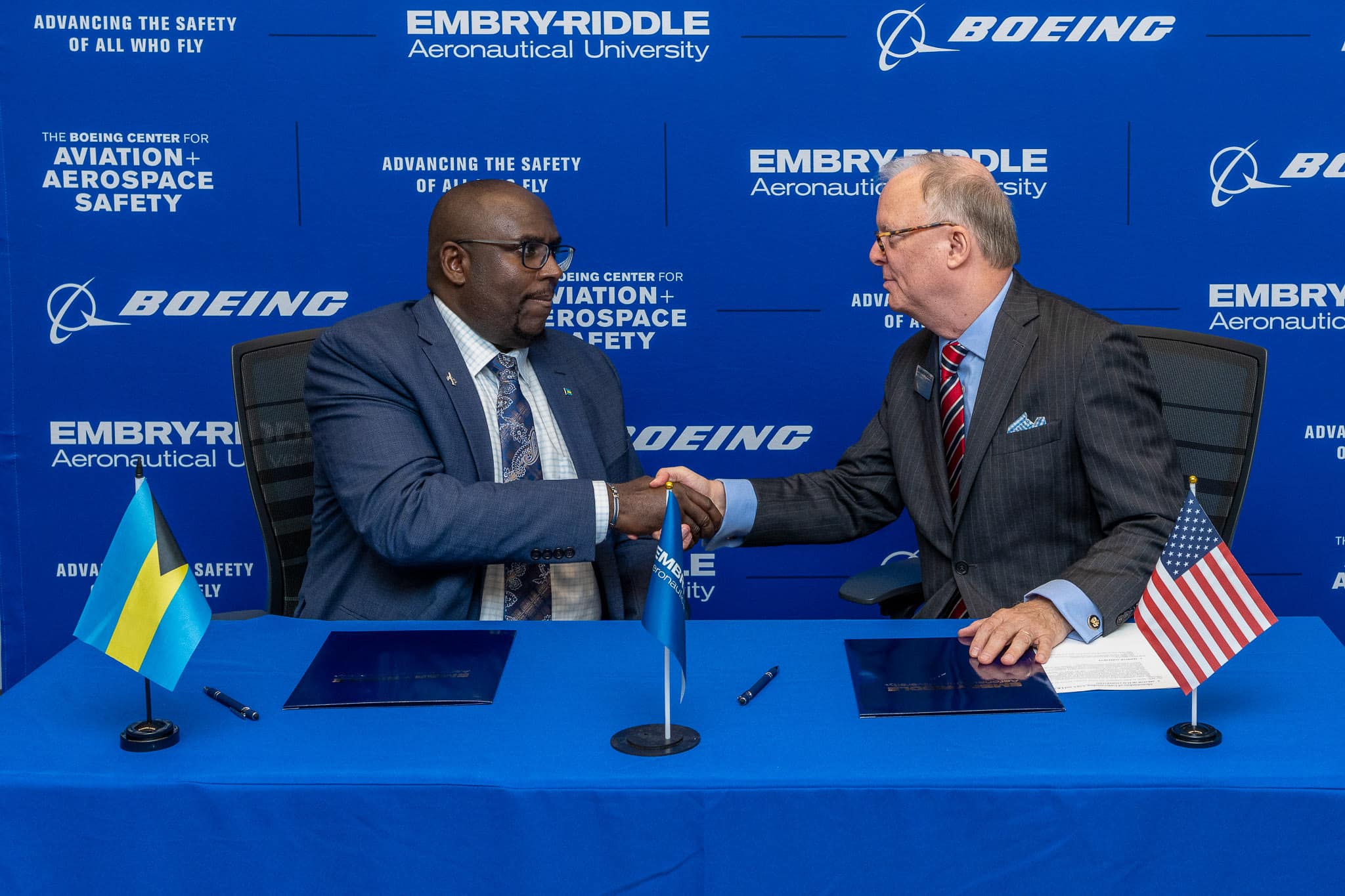 Kendall Dorsett Jr., chief investigator of Air Accidents at the AAIA of the Bahamas, and Robert Sumwalt, executive director of the Boeing Center for Aviation and Aerospace Safety, sign a memorandum of understanding to make Embry-Riddle the official training partner of the AAIA.
