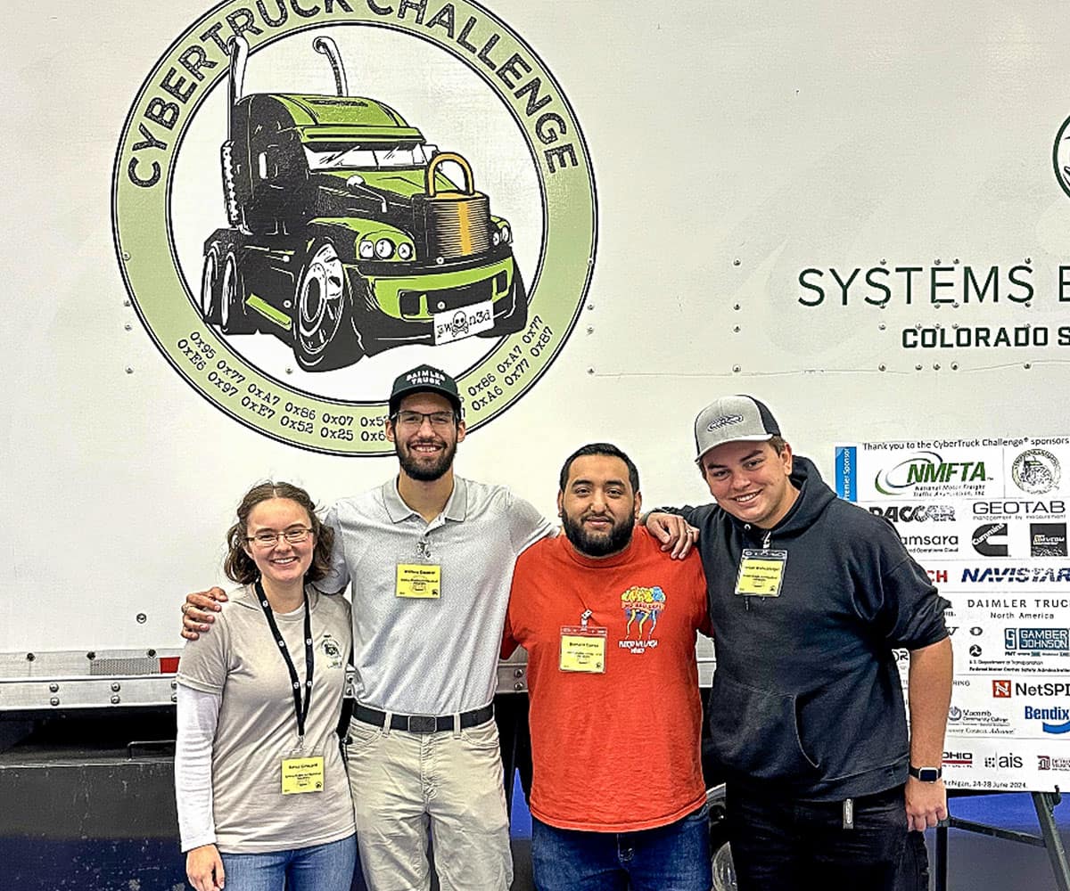 Embry-Riddle students (from left) Reina Girouard, William Decator, Bernard Correa III and Jordan Wallschlaeger attend the Cyber Truck Challenge in June 2024