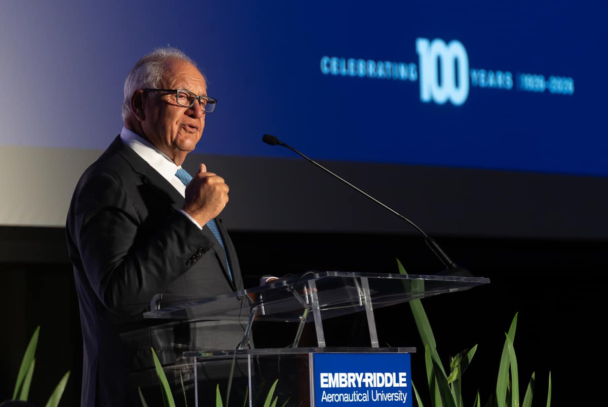 Embry-Riddle Board of Trustees Chairman Mori Hosseini speaks at the university’s centennial event on Thursday, March 26, at the Daytona Beach Campus.