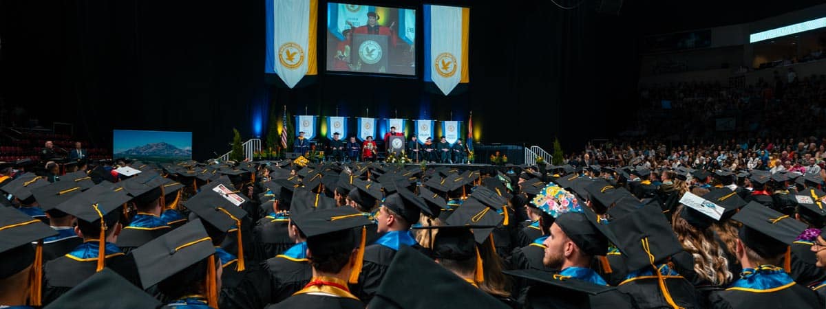 Students at a graduation ceremony.