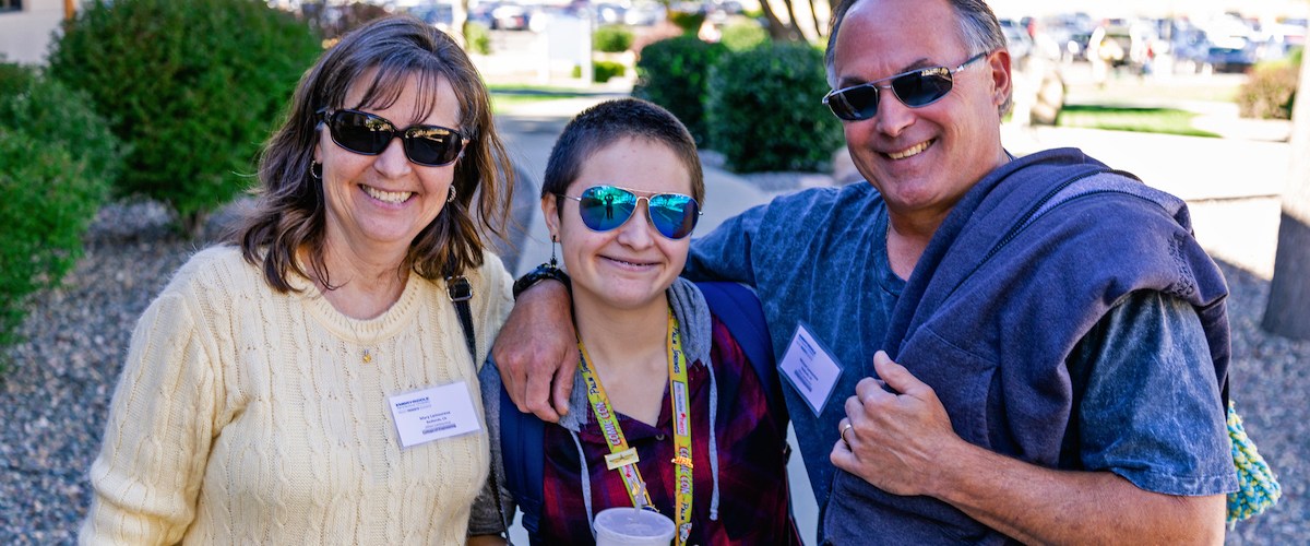 A student welcomes her family to campus during Embry-Riddle's Parents & Family Weekend