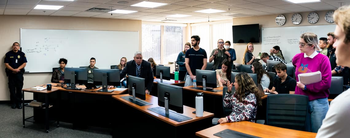 Students work during a security class