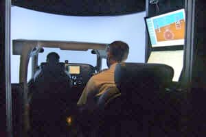 A student practices his flying in the Paradigm Cessna 172 AATD Simulator at Embry-Riddle's Prescott campus