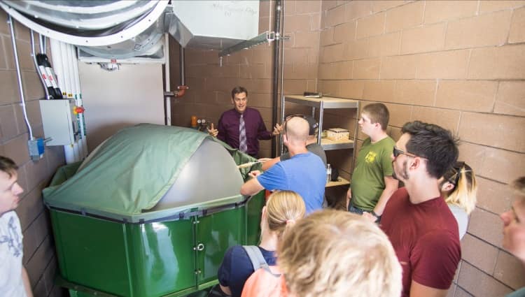 Students learning to prepare a weather balloon for launch
