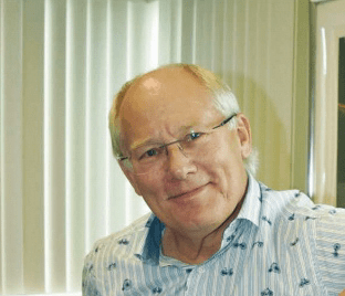 Headshot of Dr. Andrew Aldrin